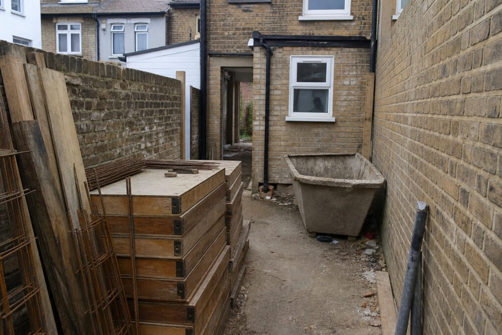 RC frame contractors Edmonton installing in-house formwork on a tight North London N9 plot